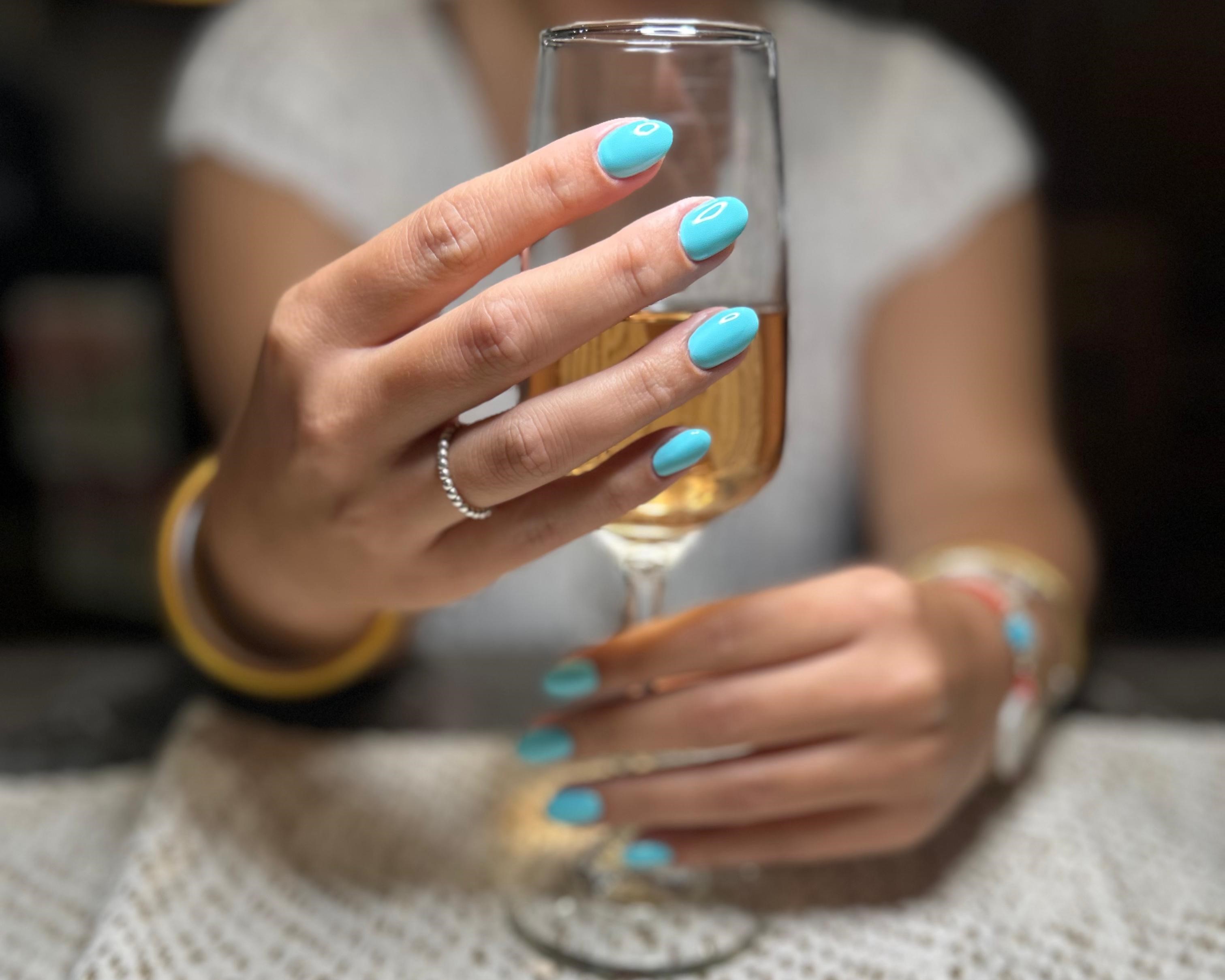 Sky blue manicure.